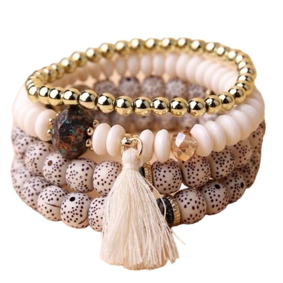 Jewelry - Four piece bead stackable bracelets
